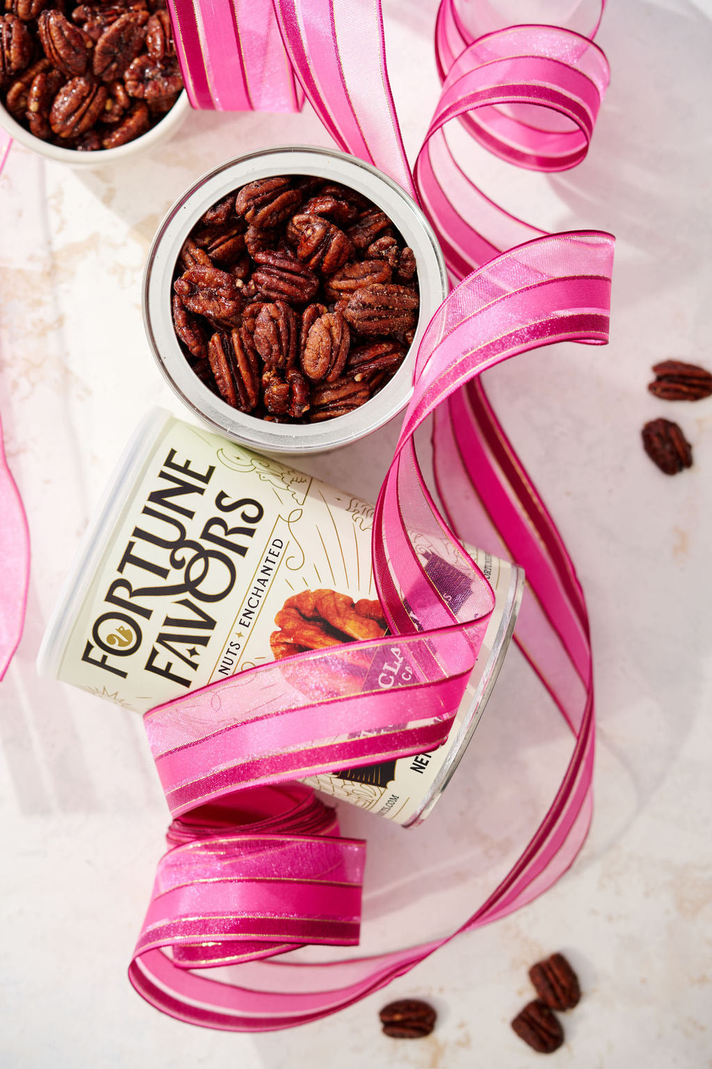 Fortune Favors candied pecan tins packed and labeled for different recipients